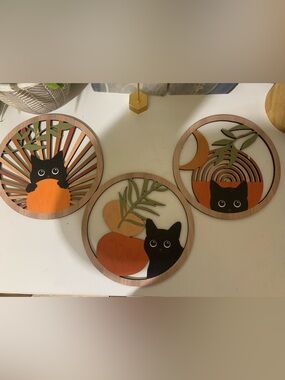 Amazon Round Wooden Cat Wall Art Trio in Black, Orange, and Green